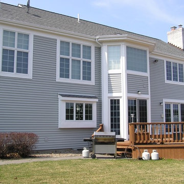 Northport Siding - Platinum Gray Clapboard with new Windows and Pewter Gray Roof