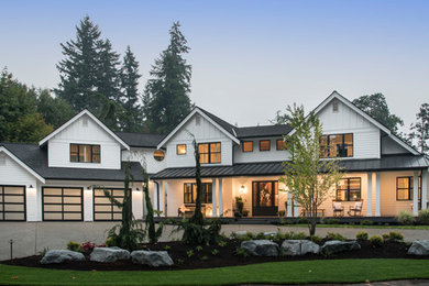 Example of a country exterior home design in Seattle