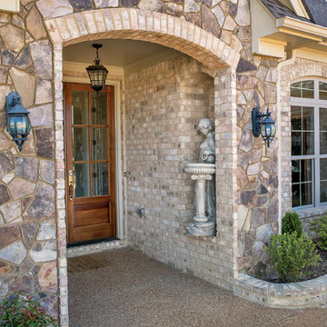 Nottingham Tudor Brick & Tennessee Fieldstone Rock Home - Tennessee