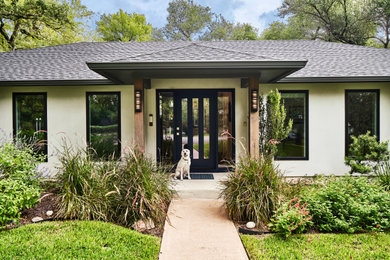 Inspiration for a 1950s exterior home remodel in Austin
