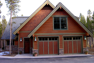 Example of a large arts and crafts brown two-story mixed siding exterior home design in Denver