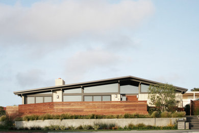 Mid-century modern one-story brick house exterior photo in Orange County