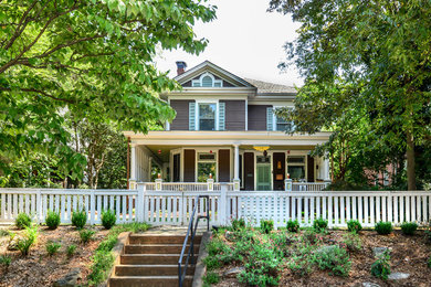 Inspiration for a mid-sized timeless brown two-story wood gable roof remodel in Atlanta