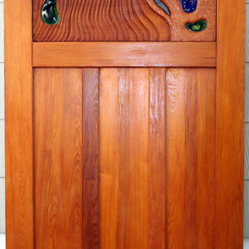 Old growth cypress  pedestrian  gate with fused glass
