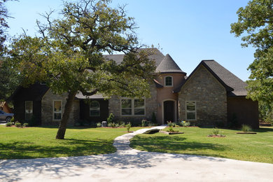 Rustic exterior home idea in Dallas