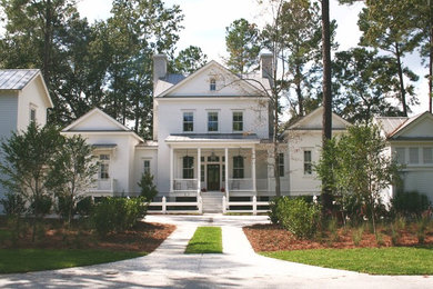 Example of a country exterior home design in Charleston