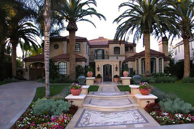 Example of a large tuscan exterior home design in Orange County