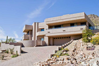 Example of a huge minimalist exterior home design in Phoenix