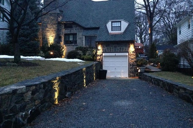 Example of a classic stone exterior home design in New York