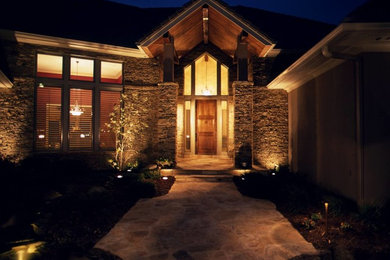 Inspiration for a mid-sized timeless multicolored one-story stone exterior home remodel in DC Metro