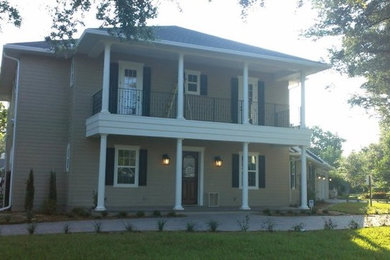 Example of a mid-sized transitional brown two-story wood exterior home design in Orlando