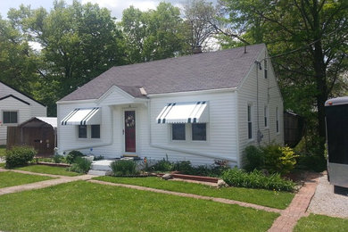 Example of a small white two-story vinyl gable roof design in Cincinnati