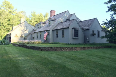 Example of an arts and crafts exterior home design in Boston