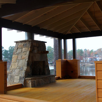 Outdoor fireplace over looking the lake