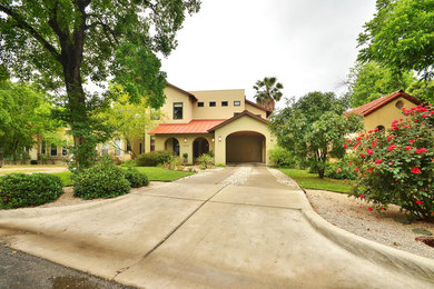 Example of a tuscan exterior home design in Austin