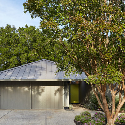 Inspiration for a 1950s one-story exterior home remodel in San Francisco with a hip roof
