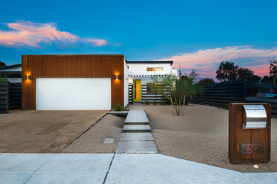 Industrial multicolored mixed siding house exterior idea in Phoenix