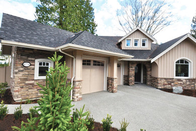 Arts and crafts beige wood exterior home photo in Vancouver