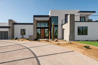 Diseño de fachada de casa blanca contemporánea de dos plantas con tejado plano