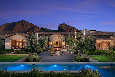 Large southwest one-story exterior home photo in Phoenix