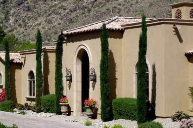 Inspiration for a mediterranean exterior home remodel in Phoenix