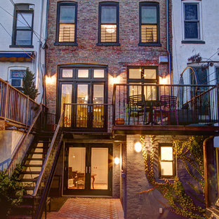 Elegant brick exterior home photo in New York
