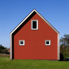 Farmhouse Exterior by ZeroEnergy Design