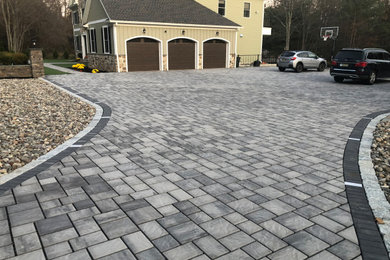 Photo of a front yard concrete paver landscaping in New York.