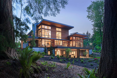 Trendy three-story exterior home photo in Seattle