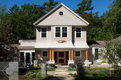 Example of a transitional exterior home design in Other