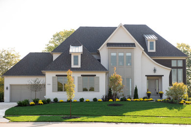 Inspiration for a transitional white two-story brick house exterior remodel in Indianapolis with a shingle roof