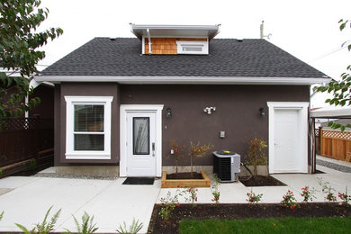 Small traditional two-story exterior home idea in Vancouver