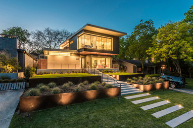 Inspiration for a mid-sized modern two-story exterior home remodel in Dallas
