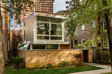 Inspiration för stora moderna grå hus, med allt i ett plan, blandad fasad och platt tak