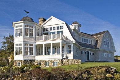 Design ideas for a beach style house exterior in Portland Maine.