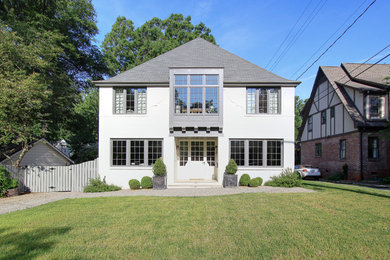 Example of a two-story exterior home design in Charlotte