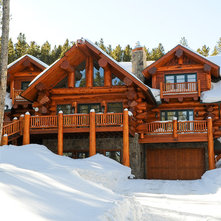 Rustic Exterior by Mountain Log Homes of CO, Inc.