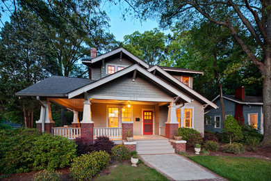 Example of an arts and crafts brown exterior home design in Charlotte