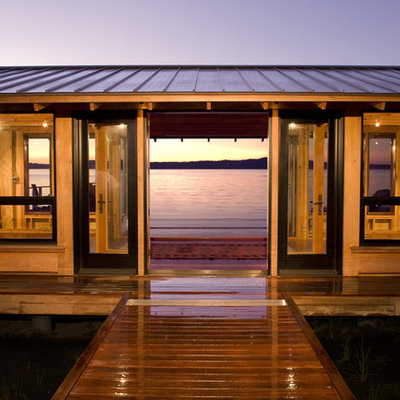 Inspiration for a timeless wood exterior home remodel in Seattle