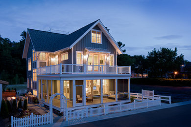 Design ideas for a beach style house exterior in Grand Rapids.