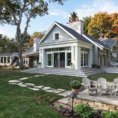 Inspiration for a timeless stone gable roof remodel in Minneapolis