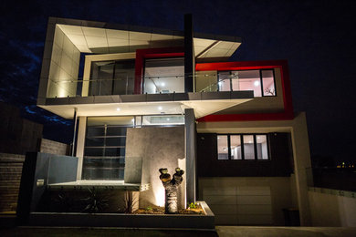 パースにある高級なコンテンポラリースタイルのおしゃれな家の外観 (メタルサイディング) の写真