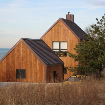 Elegant brown two-story wood gable roof photo in Chicago