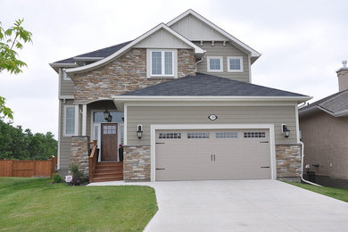 Example of a mid-sized arts and crafts garage design in Other
