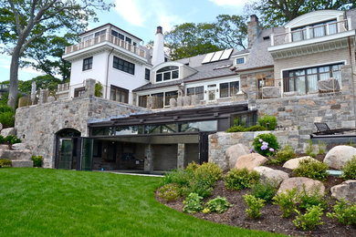 Large coastal exterior home idea in Boston