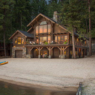 Inspiration for a mid-sized rustic brown two-story wood exterior home remodel in Seattle with a shingle roof