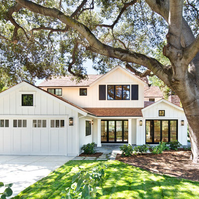 Country white two-story wood gable roof idea in San Francisco