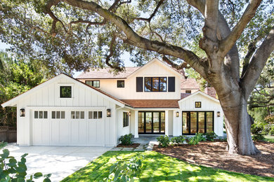 Country white two-story wood gable roof idea in San Francisco