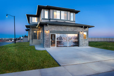 Inspiration for a transitional exterior home remodel in Calgary