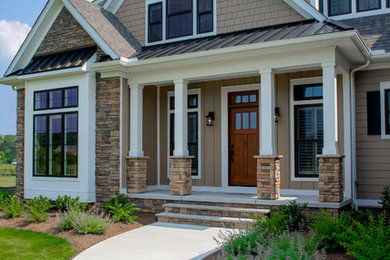 Inspiration for a timeless two-story mixed siding exterior home remodel in DC Metro